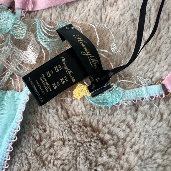 Honey Birdette Candy Blue Thong Panty Size XS
With back stone - Picture 5 of 8